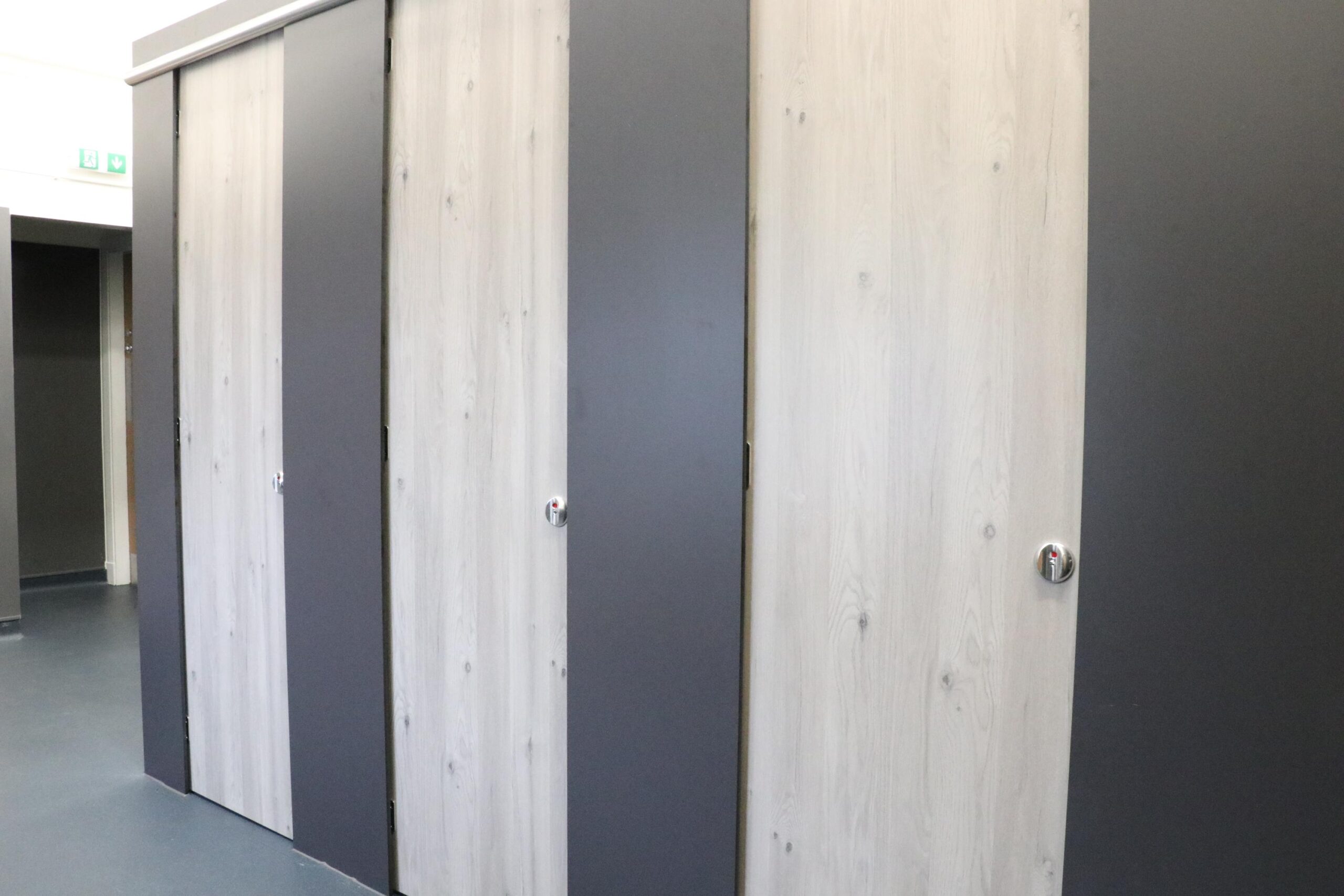toilet cubicles with doors closed